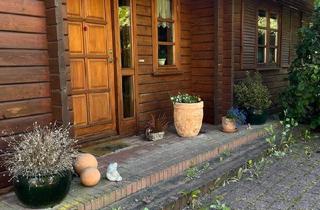 Einfamilienhaus kaufen in 24963 Tarp, Tarp - Einfamilienhaus - Holzhaus in grüner Idylle