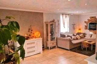 Wohnung kaufen in 33729 Bielefeld, Bielefeld - Modernisierte Wohnung mit eigenem Garten, Wintergarten & Garage