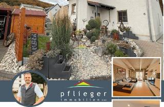 Doppelhaushälfte kaufen in 93309 Kelheim, Doppelhaushälfte mit zwei Wohnungen und liebevoll angelegtem Garten