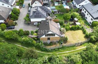 Einfamilienhaus kaufen in 64560 Riedstadt, Wohngenuss - Raumwunder in schöner Feldrandlage