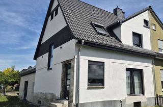 Doppelhaushälfte kaufen in 59174 Kamen, Top-Angebot! Modernisierte und bezugsfreie Einfamilien-Doppelhaushälfte mit 2 Garagen