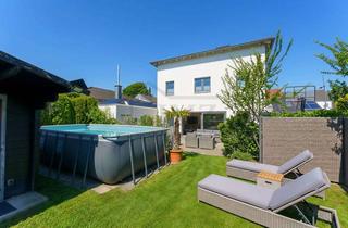 Villa kaufen in 44625 Holsterhausen, Moderne Stadtvilla mit Erdwärme, Südgarten & Pool in ruhiger Wohnlage