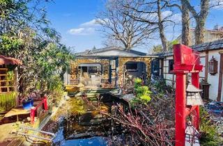 Haus kaufen in 23569 Kücknitz, Erbbaurecht: 2,5-Zimmer-Bungalow mit Nebengebäude in Lübeck