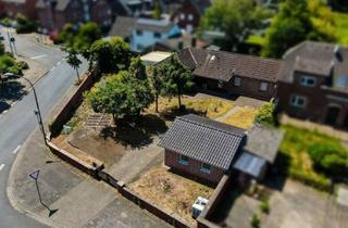 Grundstück zu kaufen in 41542 Dormagen, Eckgrundstück mit Entwicklungspotenzial – Reihenendbungalow mit genehmigter Bauvoranfrage