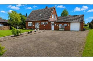 Haus kaufen in 26802 Moormerland, Familienidylle auf großem Grundstück – Zuhause im Grünen von Moormerland