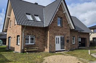 Einfamilienhaus kaufen in 33428 Harsewinkel, Neuwertiges Einfamilienhaus in Harsewinkel-Greffen mit optionaler Einliegerwohnung.