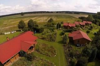 Haus kaufen in Genzienes Dofstraße Arendsee (Altmark) Ot Genzien, 39619 Arendsee, Einzigartiges finnisches Blockhausanwesen auf 5.912 qm Parkgrundstück