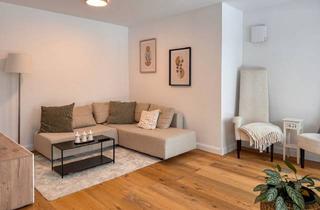 Wohnung kaufen in 27570 Bremerhaven, Stilvoll Wohnen: ebenerdige 3 Zimmer mit eigenen Garten u. Tiefgarage am Bürgerpark Neubau aus 2023