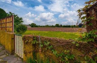Doppelhaushälfte kaufen in 46446 Emmerich, Emmerich-Elten: Wohnen am Feldrand – viel Potenzial, viel Aussicht