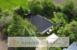 Haus kaufen in 27249 Mellinghausen, Traumlage in Sackgasse am Feldrand - neuwertiger Bungalow mit Carport und Gartenhaus - TOP