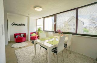 Wohnung kaufen in 91154 Roth, Roth - Gemütliche 2-Zimmer-Wohnung mit großem, lichtdurchfluteten Wintergarten