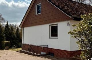 Einfamilienhaus kaufen in 21398 Neetze, Neetze - Haus mit ausgebautem Keller, Garage und großem Südgrundstück
