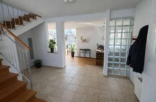 Wohnung kaufen in 90613 Großhabersdorf, Stilvolle Maisonettewohnung mit Wintergarten und viel Platz zum Wohlfühlen