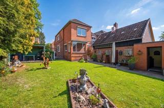 Doppelhaushälfte kaufen in 21502 Geesthacht, Moderne Doppelhaushälfte mit Gartenparadies hinter charmanter Fassade