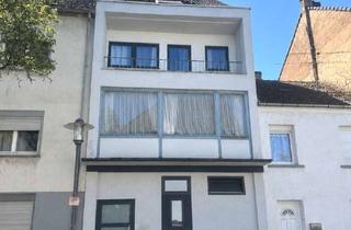 Haus kaufen in 66763 Dillingen, Charmantes Zweifamilienhaus mit Garten und großzügigen Wohnbereichen