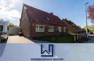 Doppelhaushälfte kaufen in 18258 Schwaan, Doppelhaushälfte mit Entwicklungspotenzial in Schwaan