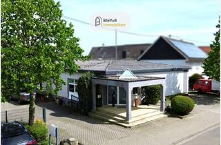 Gewerbeimmobilie kaufen in 35423 Lich, Sofort nutzbare Gewerbeimmobilie mit großen Lager- und Büroflächen in Lich - Langsdorf
