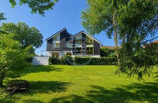 Wohnung kaufen in 21465 Reinbek, Exklusives Wohnerlebnis: Lichtdurchflutete Maisonette mit „Haus-im-Haus“-Charakter & Privatgarten