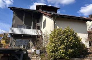 Einfamilienhaus kaufen in Sonnenleite 19, 97532 Üchtelhausen, Exklusives Einfamilienhaus mit Panoramablick über Üchtelhausen