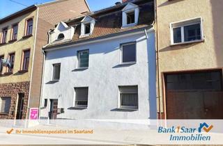 Haus kaufen in 66538 Neunkirchen, Interessante Kapitalanlage in Neunkirchen - Voll vermietetes Dreifamilienhaus mit Garagengrundstück