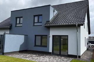 Doppelhaushälfte kaufen in 38468 Ehra-Lessien, Ehra-Lessien - Moderne Doppelhaushälfte in Lessien