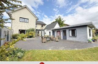 Haus kaufen in 28816 Stuhr, Stuhr - Wohnen mit Gartenidylle und vielen Optionen