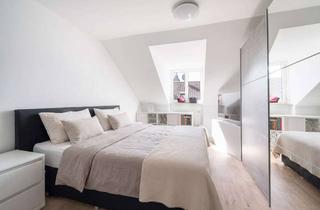 Wohnung kaufen in 85435 Erding, Zuhause über den Dächern von Altenerding – Charmante Dachgeschosswohnung mit Süd-West-Balkon