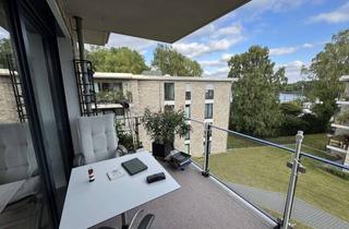 Wohnung kaufen in Mühlenweg, 23568 Schlutup, Exklusive Eigentumswohnung mit unverbaubarem Traveblick und Süd-Balkon
