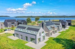 Haus kaufen in 18528 Bergen, Luxuriöser Erstbezug: 8 exklusive Neubauhäuser auf privater Halbinsel mit Wasserblick