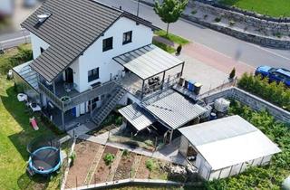 Einfamilienhaus kaufen in 97877 Wertheim, Modernes Einfamilienhaus mit ELW, Garten und Carport