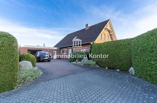 Einfamilienhaus kaufen in 26624 Südbrookmerland, Geräumiges, gepflegtes Einfamilienhaus mit Garage, Terrasse und Gartenanlage in ruhiger Lage!