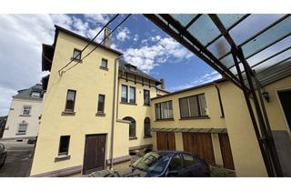 Mehrfamilienhaus kaufen in 08236 Ellefeld, Attraktive Kombination aus Wohnraum und Gewerbefläche mit Entwicklungsmöglichkeiten