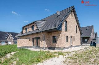 Doppelhaushälfte kaufen in 26434 Wangerland, Exklusive KfW55-Neubaudoppelhaushälfte in begehrter Lage von Hooksiel
