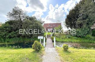 Einfamilienhaus kaufen in 26452 Sande, Weitblick und Gartenidylle: Historisches Einfamilienhaus auf großzügigem Naturgrundstück