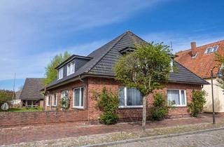 Mehrfamilienhaus kaufen in 25774 Lunden, Solides Mehrfamilienhaus mit vier vermieteten Wohneinheiten in Lunden