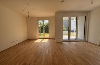 Wohnung kaufen in 55130 Weisenau, Exklusive 3-Zimmer-Erdgeschosswohnung in Rheinlage von Mainz-Weisenau