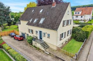 Haus kaufen in 32689 Kalletal, Charmantes Zweifamilienhaus in ruhiger Siedlung, Nähe Schlosssee