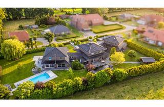 Villa kaufen in 26629 Großefehn, Exklusive Architektenvilla auf parkähnlichem Grundstück mit Pool und Galerieebene