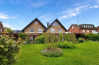 Einfamilienhaus kaufen in 59320 Ennigerloh, Einfamilienhausgefühl – hochwertige KfW-60 DHH in stilvoller Landhausarchitektur mit Keller