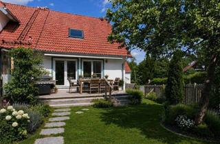 Haus kaufen in 82284 Grafrath, Charmantes Eckhaus mit drei Wohneinheiten und sonnigem Grundstück