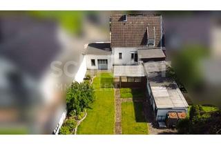 Doppelhaushälfte kaufen in Bahnhofstr. 11, 52428 Jülich, Gut aufgeteilte Doppelhaushälfte mit großer Garage und Garten in gewachsener Ortsbebauung von Güsten