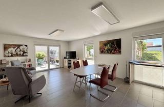 Wohnung kaufen in 76872 Minfeld, Barrierefreie Erdgeschosswohnung mit Terrasse und zwei Stellplätzen