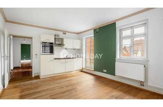 Wohnung kaufen in 71706 Markgröningen, Altbaucharme am Marktplatz: 2 Zimmer mit Stil und Stellplatz