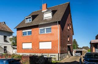 Mehrfamilienhaus kaufen in 50354 Hürth, Attraktives Mehrfamilienhaus mit drei Wohneinheiten und Garagen in Hürth-Kendenich