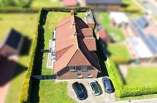 Mehrfamilienhaus kaufen in 26802 Moormerland, Attraktive Kapitalanlage in zentraler Lage! Gepflegtes Vierfamilienhaus in Moormerland!