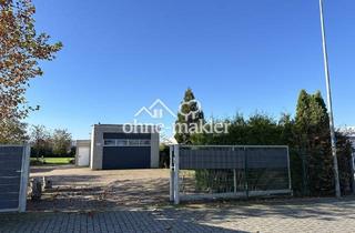 Lager kaufen in Im Büntefeld 11a, 30974 Wennigsen, Gewerbegrundstück mit großen Garagen und Wohnoption in Feldrandlage
