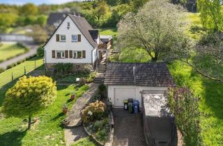 Einfamilienhaus kaufen in 35305 Grünberg, Einfamilienhaus mit Charme, großem Grundstück und vielseitigem Potenzial – ruhige Lage von Queckborn