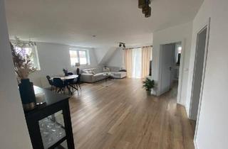 Wohnung kaufen in 27777 Ganderkesee, Ganderkesee - Moderne und zentrale Eigentumswohnung mit Kamin, Balkon & Carport