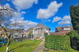 Haus kaufen in 53919 Weilerswist, Weilerswist - Zweifamilienhaus mit großem Garten!