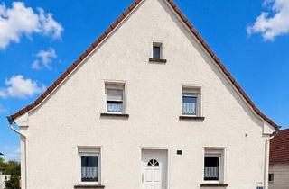 Haus kaufen in 66424 Homburg, Homburg - Flexibles Zweifamilienhaus mit großem Grundstück in begehrter Lage